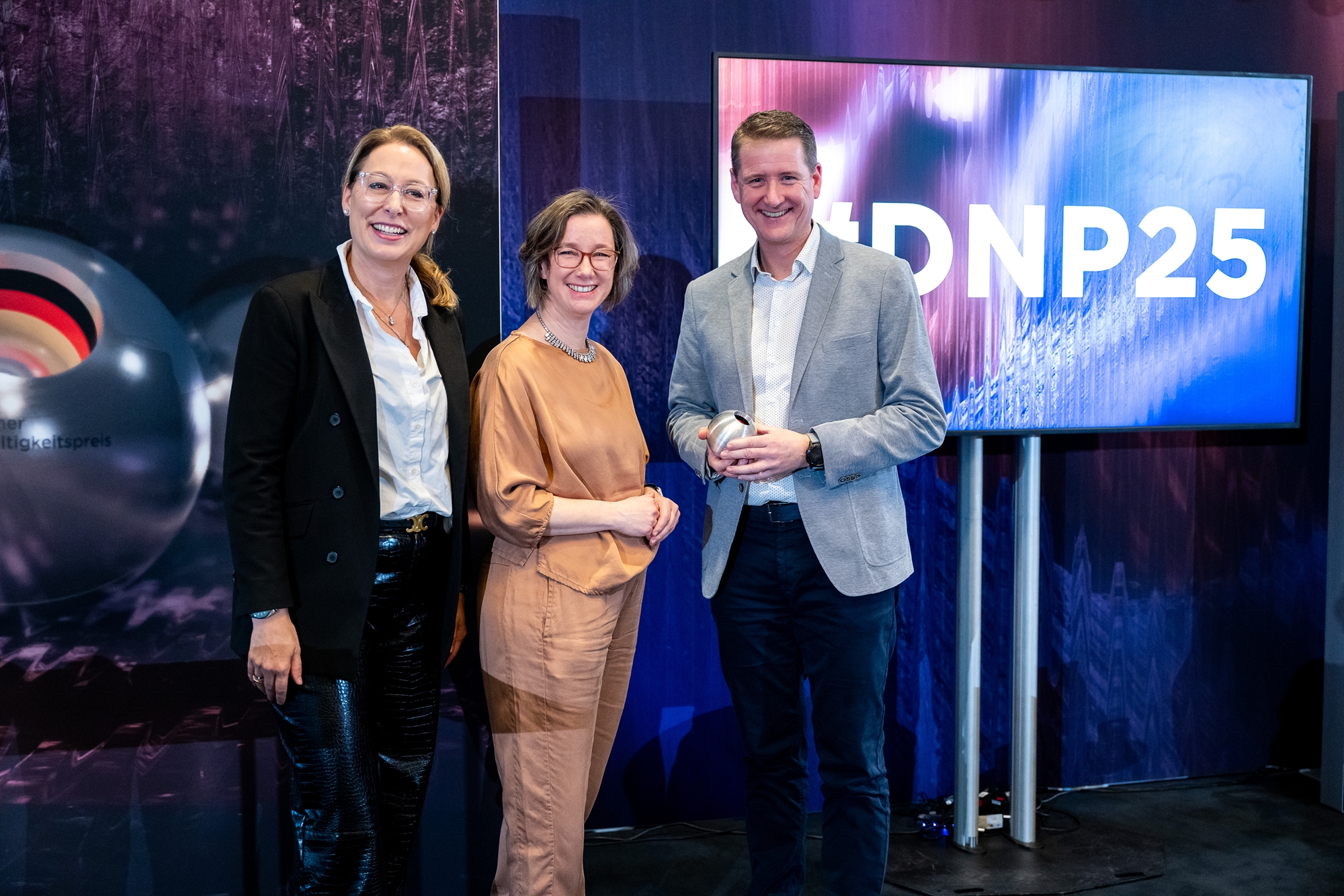 Im Bild vlnr: Dr. Christine Lemaitre (Geschäftsführender Vorstand DGNB e.V.), Yvonne Zwick (Vorsitzende Baum e.V.), Michael Eyrich-Halbig, Foto: Christian Köster, https://koester-fotografie.de/